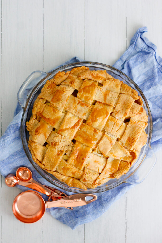 Salted caramel apple pie with a flakey lattice crust.